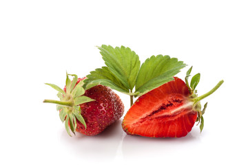 Strawberries with leaves. Isolated on a white background.