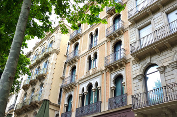 Fototapeta premium Traditional Facade with Balconies in a Modernist House in Barcelona, Spain