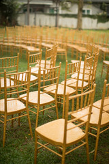 a gold colour chiavari chair for rustic garden wedding decoration