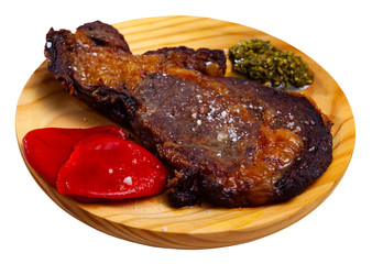 Fried veal entrecote with pesto and peppers