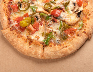 Pizza in a cardboard box. Top view