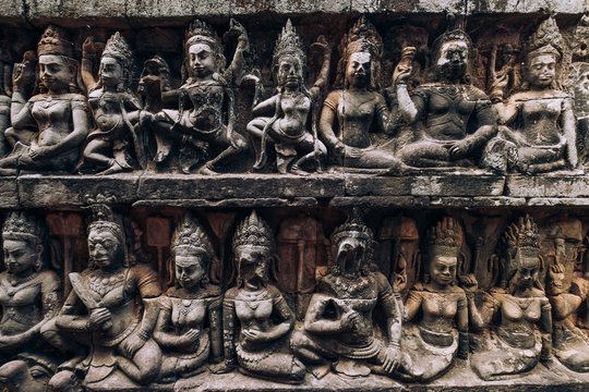 Cambodia. Angkor wat. Antiquity. Ancient architecture. The image of ancient people on the walls