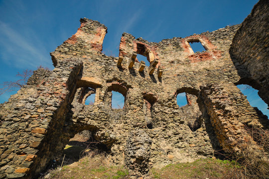 The ruins of Soimos Citadel on the Cioaca Tăutului hill in Soimos, Romania
