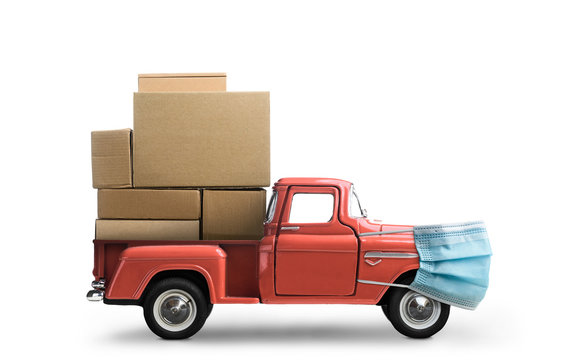 Safe Delivery. Car In Mask Delivering Blank Boxes. Loaded Pickup Truck With Protection Isolated On White Background.