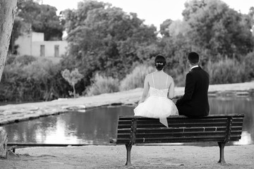 Bride and Groom on the bench