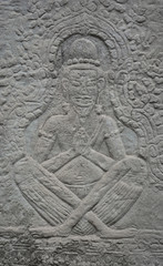 Bas relief on the walls of Bayon Temple, ancient city of Angkor Thom in Cambodia