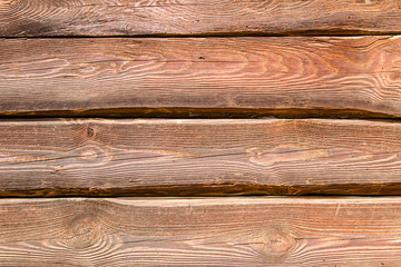 Deski z wyraźna strukturą drewna.  Tło - stare deski.