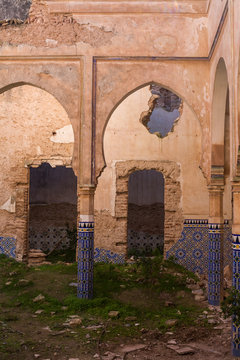 Column with tiles in a yard, Dar Caid Hadji
