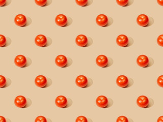 ripe fresh tomatoes on beige background, seamless pattern
