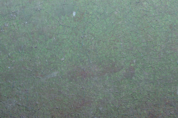Old painted wall with cracked paint