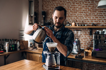 Man prepares coffee in style 