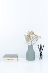 Vase and furnishings in a modern minimalist home.