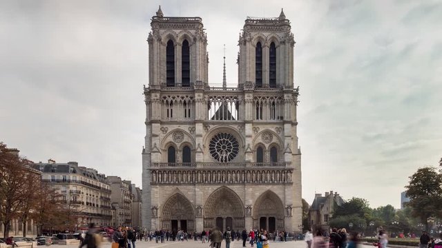 Day view of the gothic Notre Dame cathedral in Paris timelapse