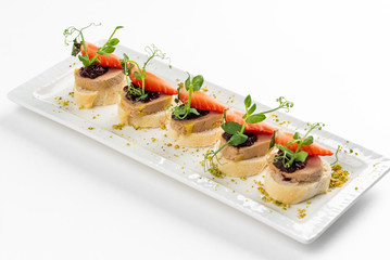 Assorted snacks for a buffet on a white background
