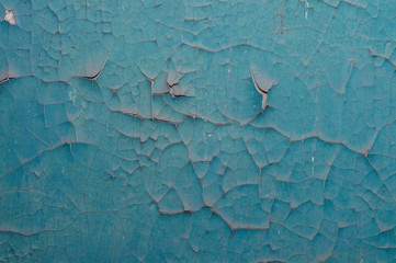 Old painted wall with cracked paint