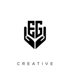 Fototapeta premium eg shield hand logo design vector icon