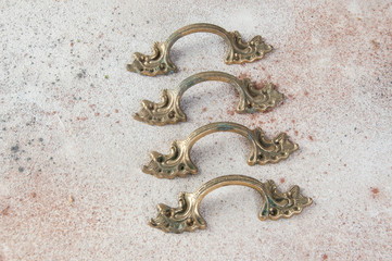 Four antique furniture dresser handles