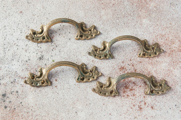 Four antique furniture dresser handles