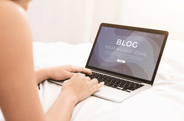 Fototapeta premium Unrecognizable female blogger working with laptop in her comfy bed, collage