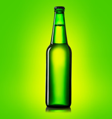 green beer bottle on a green background