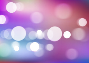 Abstract bokeh lights on blurred colors background