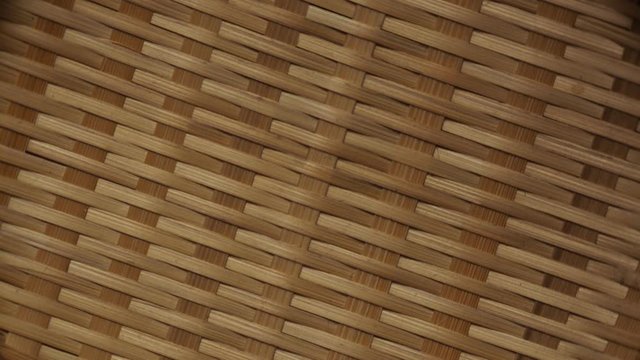 wicker basket close-up, smoothly rotates