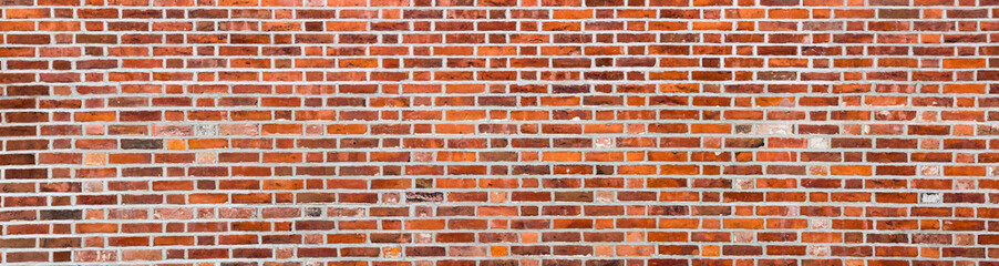 Aged Red Brick Wall texture background. Old stone panoramic background.