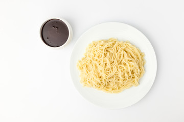 Noodle with seasoning on white background