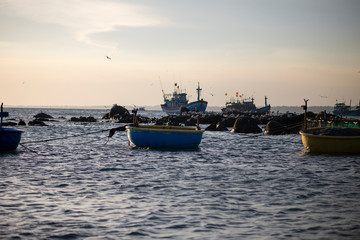 Vietnamese boat placed on a tropical beach 