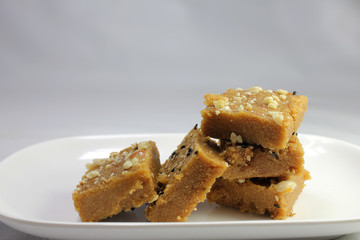 Sukhadi or Gor Papdi is Indian Traditional sweet made with wheat flour,desi ghee,jaggeery and nuts.very healthy Gujarati Mithai