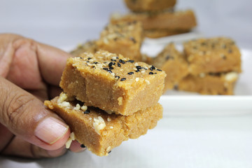 Sukhadi or Gor Papdi is Indian Traditional sweet made with wheat flour,desi ghee,jaggeery and nuts.very healthy Gujarati Mithai