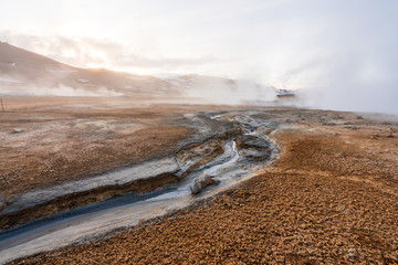 Hverarond geothermal area in Myvatn, Iceland. Steam vents and hot pools, muddy hot soil, sulfur...