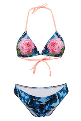 Detailed shot of a two-piece swimsuit with black and blue camo pattern consists of bikini and a triangle bra. The bra with thin pink straps is decorated with roses print. 