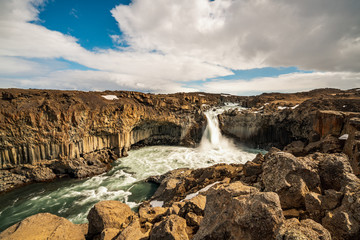 Aldeyjarfoss waterfall canyon in the highlands of Iceland. Basalt columns and powerful water flow...