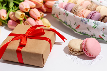 High angle of valentines present with macarons