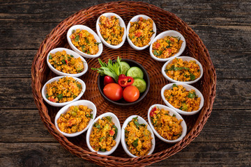 Kısır, a traditional vegan salat prepared from bulgur wheat, tomato, parsley, olive oil and spices