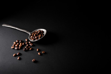 Close-up roasted coffee beans with copy space