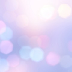 Bokeh abstract pattern on light blue lilac pink gradient background. Holiday blur pattern.