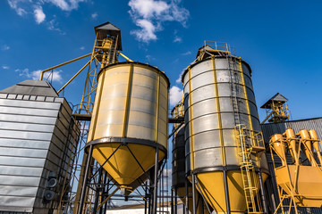 agro-processing and manufacturing plant for processing and silver silos for drying cleaning and storage of agricultural products, flour, cereals and grain. Granary elevator.