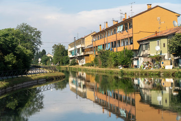 Old buildings along Naviglio Pavese, Italy