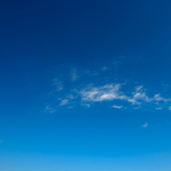Naklejka na ściany i meble White clouds in beautiful blue sky