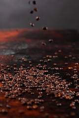 Coffee beans on the wooden table