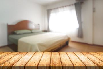 Bedroom and empty wooden desk space platform for product presentation.