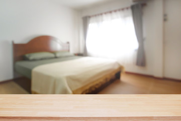 Bedroom and empty wooden desk space platform for product presentation.