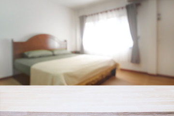 Fototapeta na wymiar Bedroom and empty wooden desk space platform for product presentation.