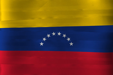 Fototapeta premium Colorful ribbon as Venezuela national flag, yellow blue and red with an arc of eight white stars on center.