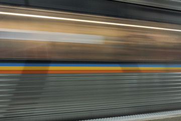 Moving subway train passing quickly in underground station in downtown Atlanta - 350557197
