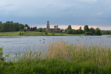 Upper Volga landscape. Ruins of the church on the bank of Sterzh Lake. Novinka village, Tver Oblast, Russia.