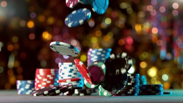 Super slow motion of falling poker chips on table. Filmed on high speed cinema camera, 1000fps.