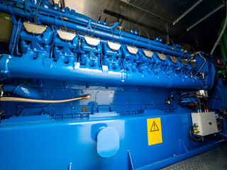 Engine of CHP unit. Diesel and gas industrial electric generator.